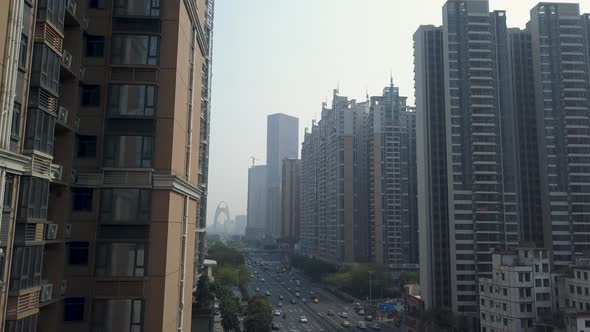 Guangzhou, China. Aerial shot of Congested living blocks and a highway with heavy traffic