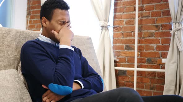 Sad Young African Man Feeling Upset and Lost, Loft Background