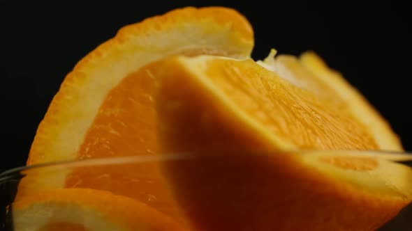 Dessert Orange Sliced In A Plate And Rotates Very Close