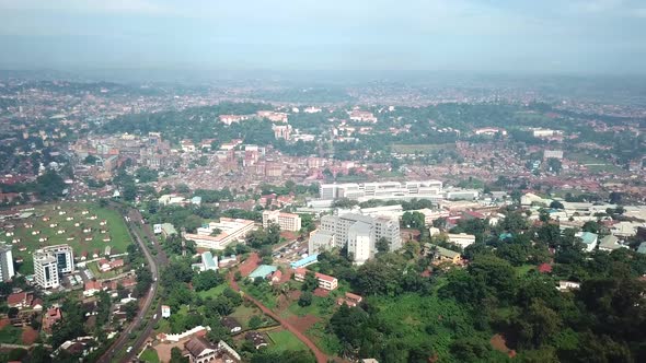 Kampala aerial cityscape of the capital of Uganda, highway and developed housing and commercial area