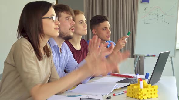 Young Managers Applause at the Office