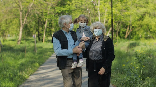 Family of Grandparents Takes Off Medical Masks After Coronavirus Quarantine End