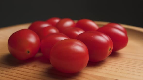 Plum tomatoes on a rotating platform. Product videography. Close up