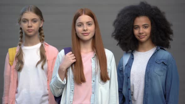 Multiethnic Group of Female Students Looking Camera Grey Background Education