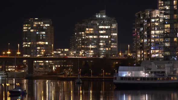 Rush Hour At Cambie Bridge Over False Creek In Downtown Vancouver BC At Night - time lapse