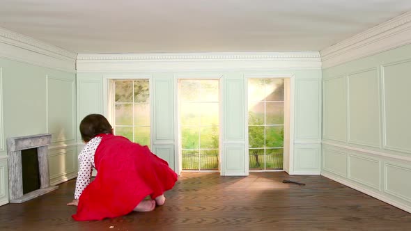 Toddler girl in tiny room with building block