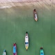 Fishing Boats at Anchor Along a Tropical Coastline Aerial - VideoHive Item for Sale