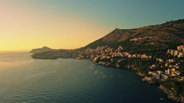 Beautiful sunset over Dubrovnik city in Croatia. Wide landscape aerial view