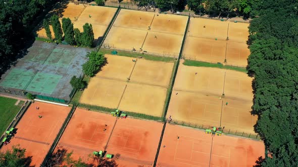 Tennis and Tennis Training on the Courts Moisturize Clay Tennis Courts  Aerial Timelapse