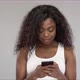 Happy African American Woman Using Smartphone - VideoHive Item for Sale