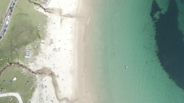 Top View Of White Sand And Clear Blue Sea At Keem Beach. Keem Bay In County Mayo, Ireland. aerial to