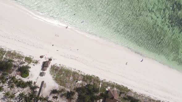 Vertical Video Boats in the Ocean Near the Coast of Zanzibar Tanzania Aerial View