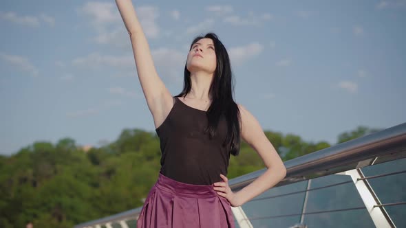 Elegant Brunette Woman Bending To the Side Outdoors on Sunny Summer Day,  Portrait of Charming