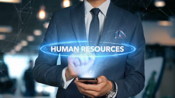 Businessman Smartphone Hologram Word   Human Resources