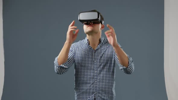 Young man in VR headset