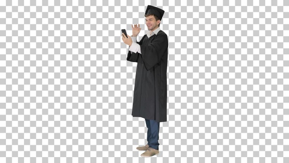 Smiling male student in graduation gown, Alpha Channel