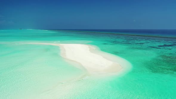 Aerial top view texture of relaxing tourist beach wildlife by transparent water with white sand back