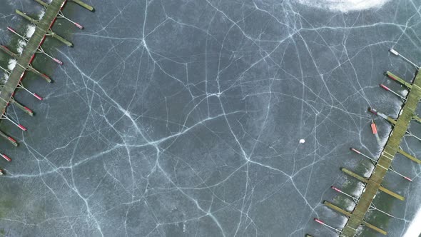 Jetty At Vik Bathavn At Steinsfjorden With Cracked Ice At Winter In Norway. - aerial descend