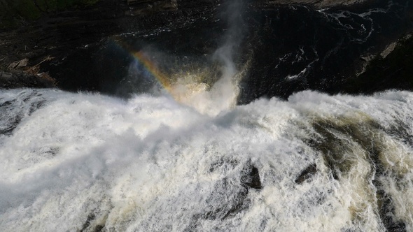 Colorful Rainbow in Waterfall Mist