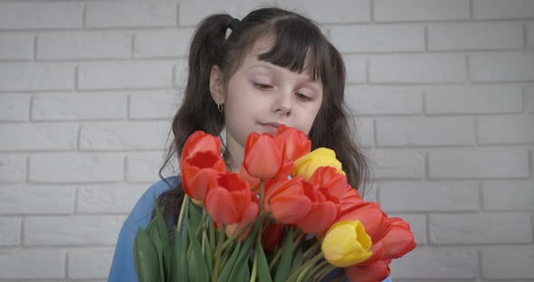 Girl with flowers.