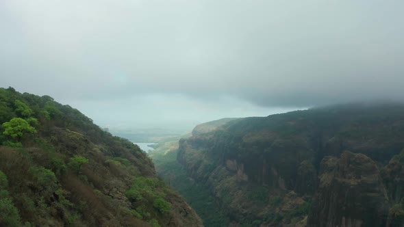 Thick Gray Clouds Over Western Ghats Mountain Range In  Mulshi, India During Monsoon Season - aerial