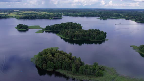 smooth aerial filming of the islands in the middle of the lake Trakai national park