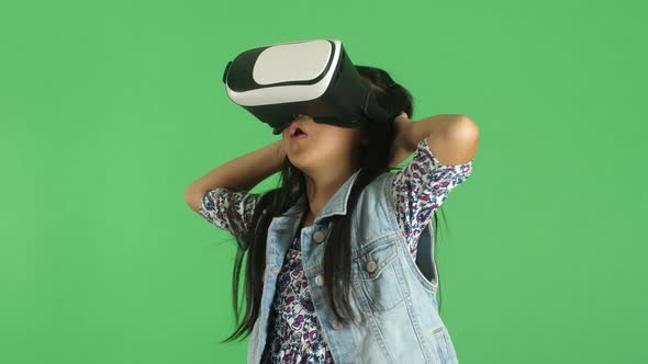 Little Girl Exploring Virtual Reality World