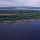 Drone is Flying Over Island in Middle of Wide River Volga in Summer Aerial View - VideoHive Item for Sale