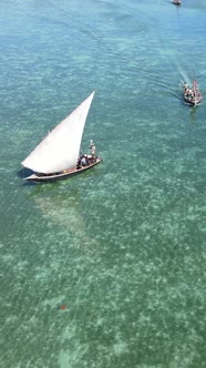 Vertical Video Boats in the Ocean Near the Coast of Zanzibar Tanzania