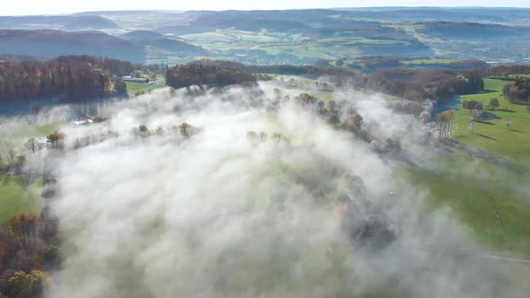 spectacular view over misty lush green valley