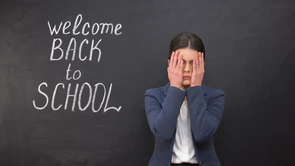 Frustrated Teacher Making Facepalm, Disappointed With Occupation Back, to School