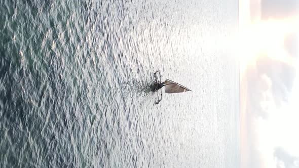 Vertical Video Boats in the Ocean Near the Coast of Zanzibar Tanzania Aerial View