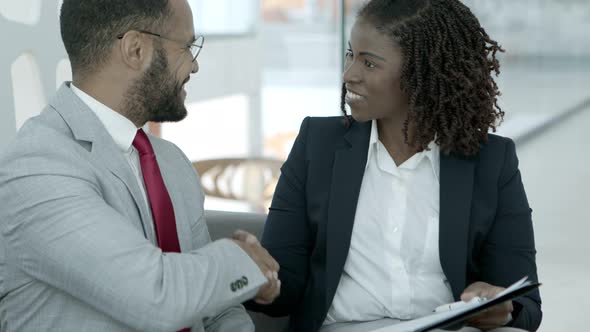 Business Colleagues Shaking Hands