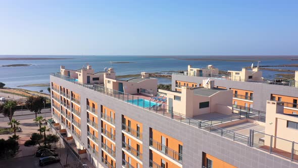 Aerial View of the Urban Area of Portugal in the South of Houses with Modern Infrastructure Swimming