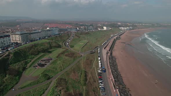 Coastal And Touristic Town Of Scarborough In The North Bay Beach Of Yorkshire, England, UK.  Aerial