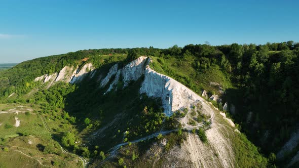 Flight Over a White Chalk Mountain