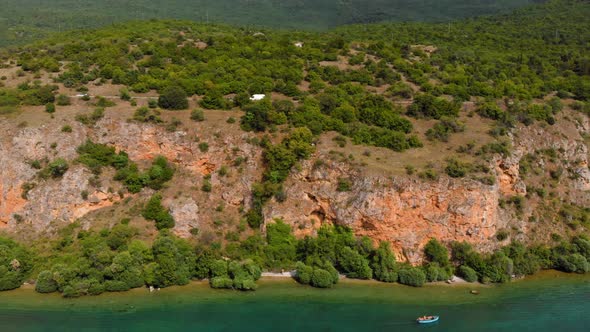 Aerial shot of Macedonia coast. Clif and beautiful water around Ohrid Lake in Southern Europe.