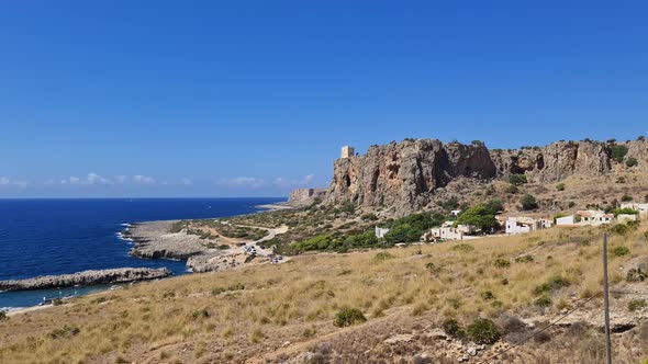 Bautiful Baia Santa Margherita and torre Isulidda medieval watchtower in Sicily. Italy