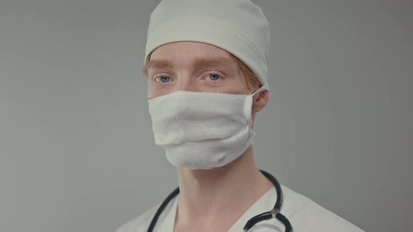 Face Of Young Doctor In White Hat
