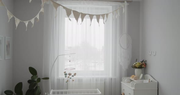 Stylish Bright Modern Baby Room Interior Crib Hanging Mobile Changing Table