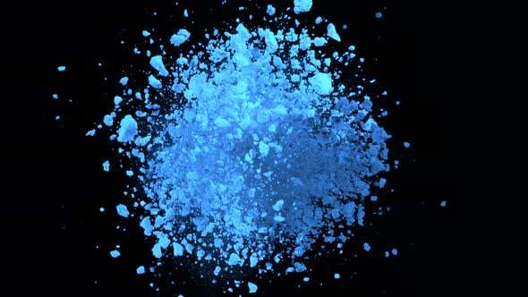 Super Slow Motion Shot of Rotating Blue Powder Expolosion Isolated on Black Background at 1000Fps