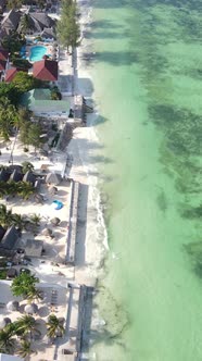 Vertical Video Boats in the Ocean Near the Coast of Zanzibar Tanzania