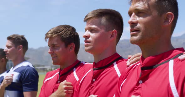 Rugby players singing before match