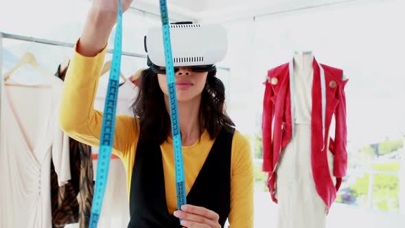 Female designer using virtual reality headset 4k