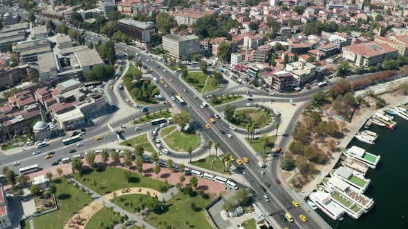 Car Traffic Intersection with Yellow Taxi Cabs in Istanbul on Bosphorus, Scenic Aerial Birds Eye