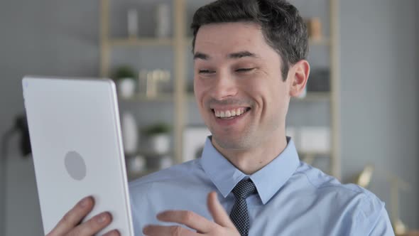 Online Video Chat By Young Man on Tablet PC