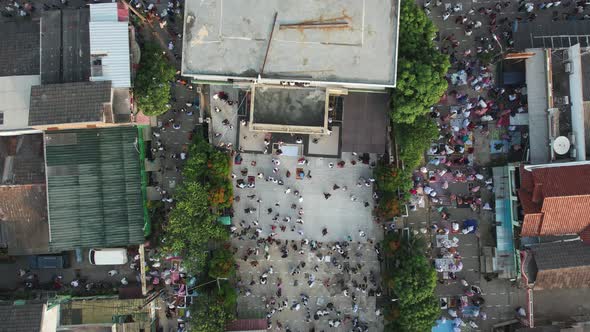 Aerial View of People offering prayers on the Eid morning at famous mosque Jama Masjid in Bekasi.