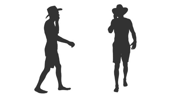 Silhouette of Young Man Walks and Talking on Smartphone, Alpha Channel