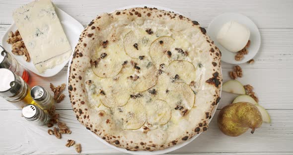 Big Pizza with 4 Cheese with Pear Ready for Eating Delicious Italian Pizza