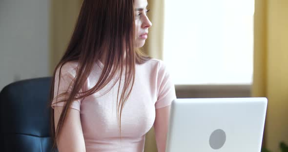 Thoughtful Businesswoman Student Girl Sit at Desk Work on Laptop Faced Challenge in Thoughts